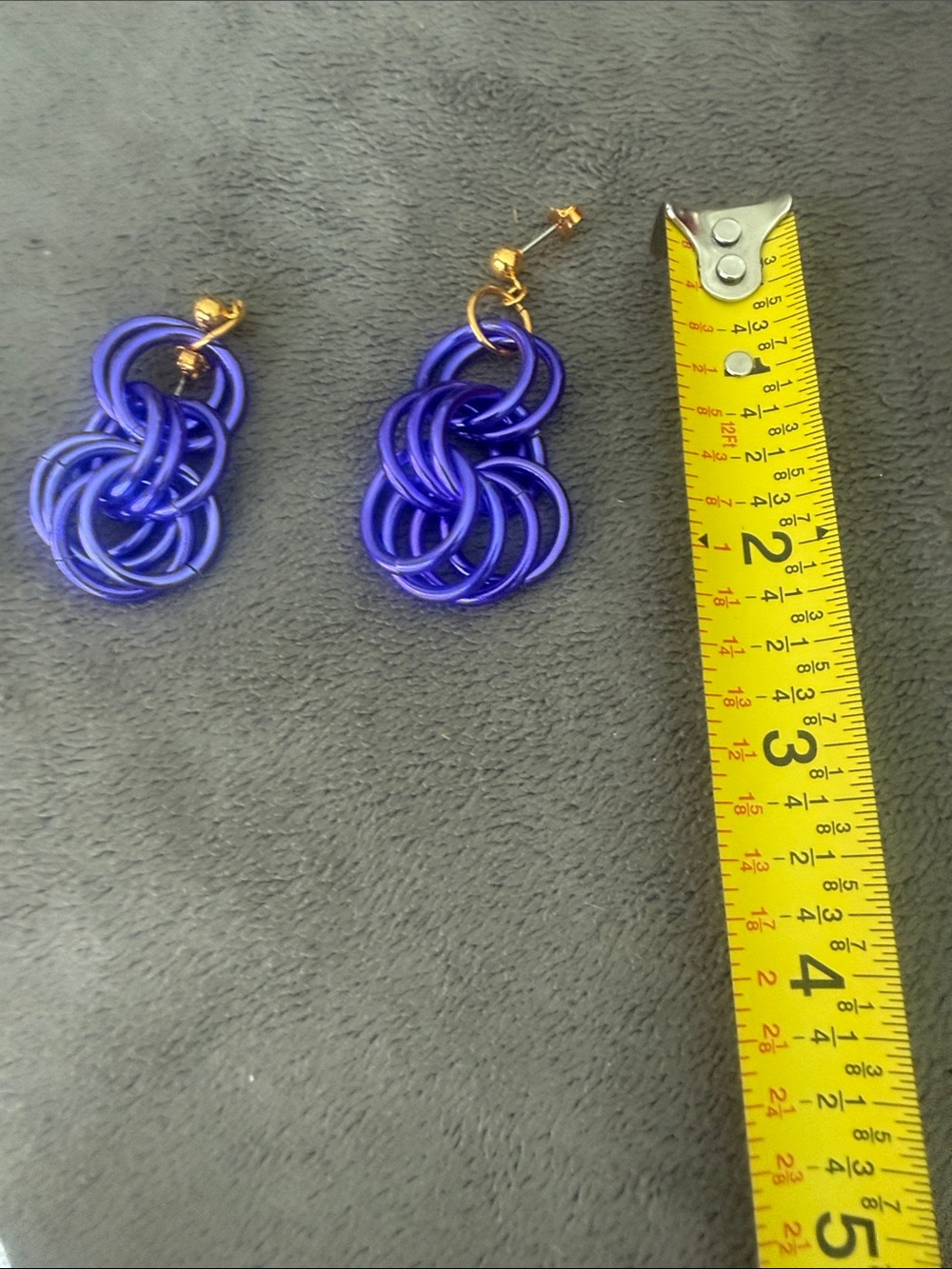 Avon purple loop de loop Drop Earrings with Gold Accents
